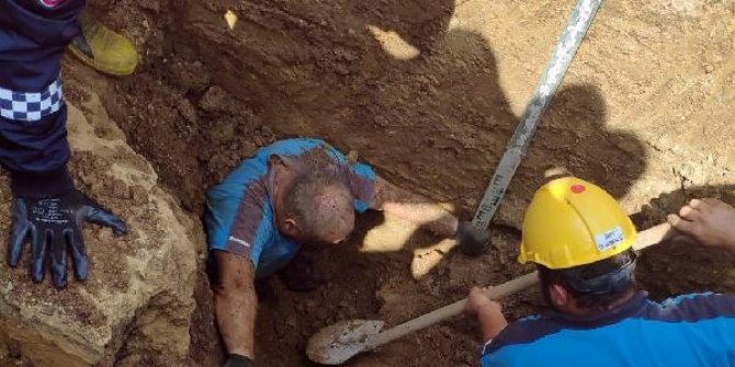 Kanal çalışmasında toprak altında kalan işçi kurtarıldı