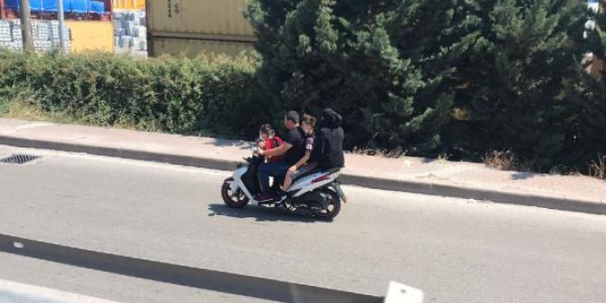 4 kişilik ailenin motosiklette tehlikeli yolculuğu