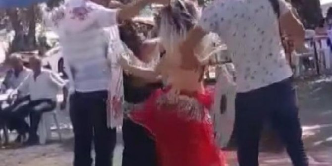 Mahalle meydanında, koronavirüse rağmen dansözlü düğün