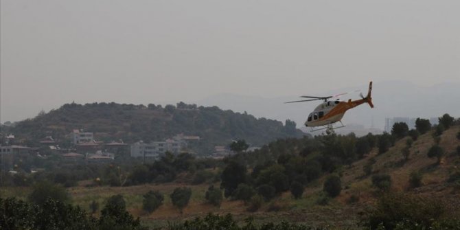 Tarım ve Orman Bakanı Pakdemirli Hatay'daki orman yangınını havadan inceledi