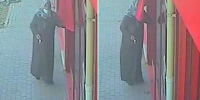 Kafe önündeki Türk bayrağını 3 kere öperek alnına koyan kadın görenleri duygulandırdı