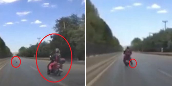 Motosikletlinin seyir halindeyken yerdeki çöpü ayağıyla alma anı kamerada
