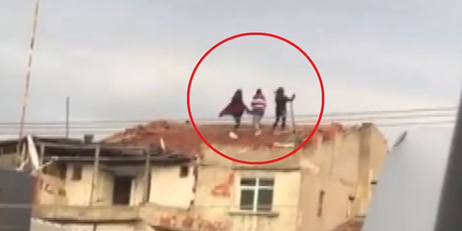 3 genç kız, çatıya çıkıp, tehlikeye aldırış etmeden video çekti