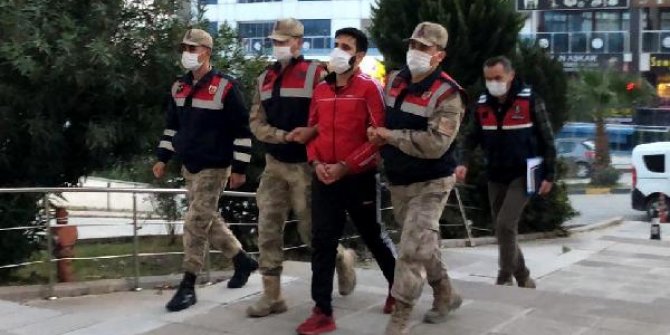 Jandarma kontrol noktasından geçerken elindeki tabancayla video çeken şüpheli yakalandı