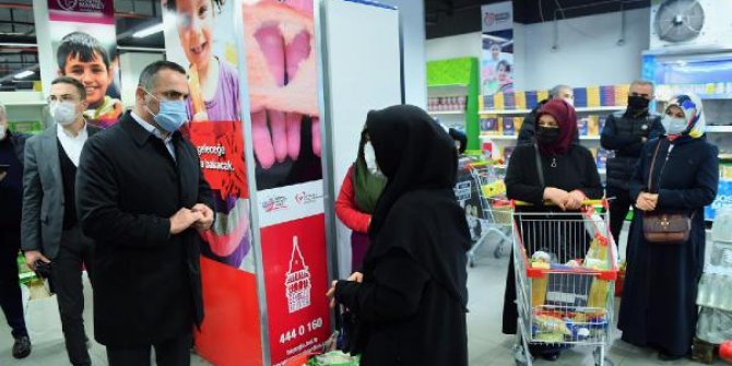 İhtiyaç sahiplerinin yüzü sosyal market ile gülüyor