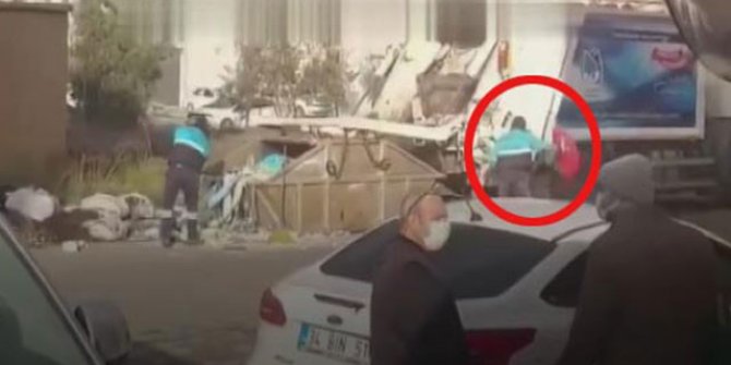 Çöpte bulduğu Türk bayrağını öpüp, çöp kamyonunun önüne astı