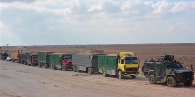 Barış Pınarı Harekatı'yla PKK/YPG'den kurtarılan köyün silolarındaki tahıl bölge halkına dağıtılıyor