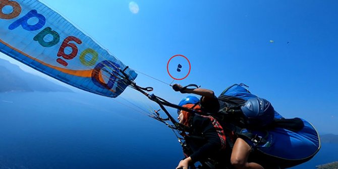 Yamaç paraşütünde uçan gözlüğü, kucağına düştü