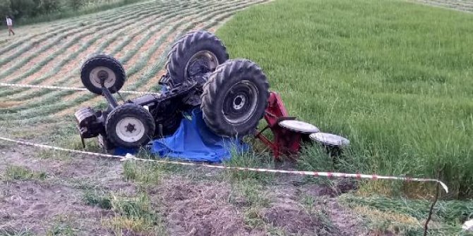 Tarlasında çalışırken devrilen traktörün altında kalan çiftçi öldü