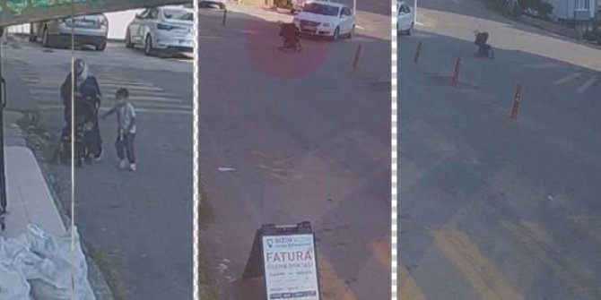İçinde 10 aylık bebeğin olduğu bebek arabası apartman bahçesine uçtu
