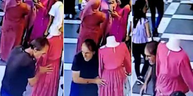 Kırmızı elbiseli cansız manken hırsızlığı kamerada