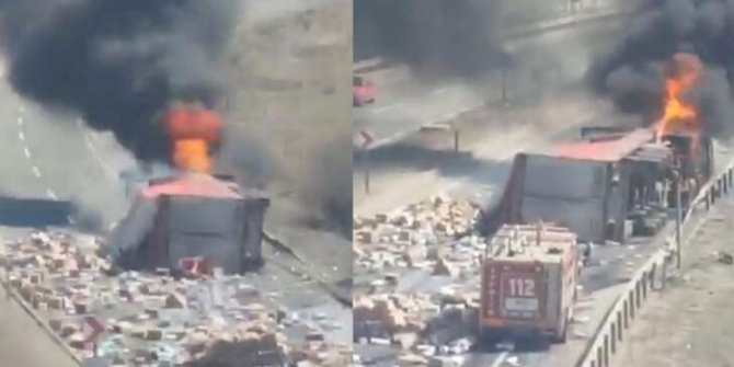 Devrilen TIR alev aldı; dorsedeki deterjan ve bebek bezleri yola saçıldı