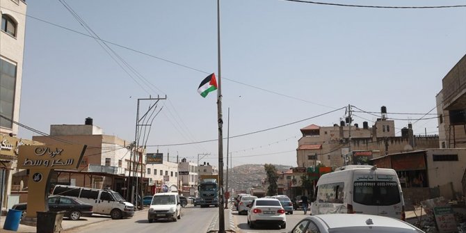 Batı Şeria'daki Huvvara beldesinde Filistinliler ile yerleşimciler arasında "bayrak" gerginliği yaşanıyor