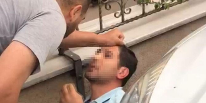 Banyodaki kadını gözetleyen şüpheliye kadının eşinden dayak