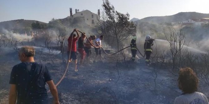 Datça'da otluk alanda çıkan yangın yerleşim yerine sıçramadan söndürüldü