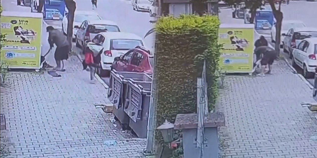 Giysi kumbarasından kıyafet çaldılar