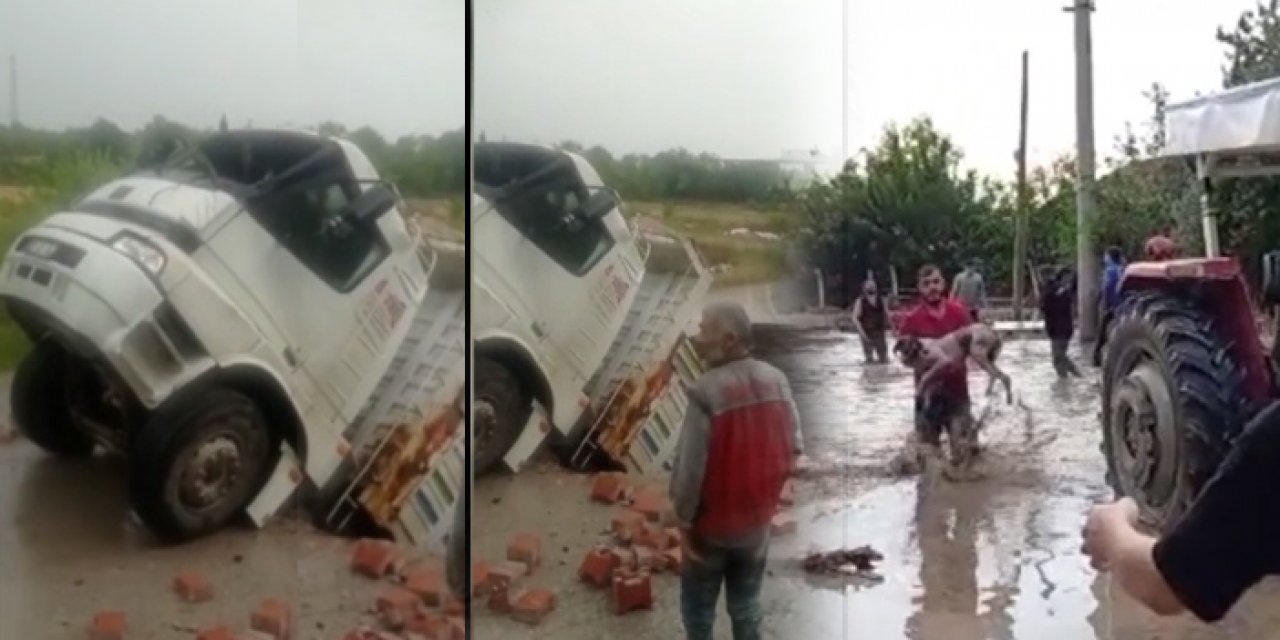 Sağanak nedeniyle yol çöktü: Bir kamyon çukura düştü