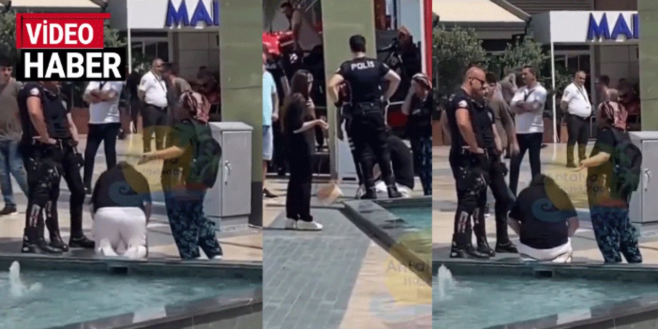 AVM'nin ortasında namaz kıldı: Polisler başında bekledi