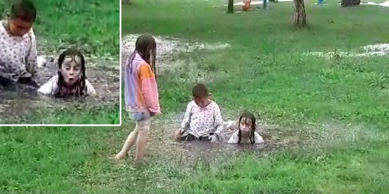 Düzce'de çocuklar su birikintilerine girerek eğlendi