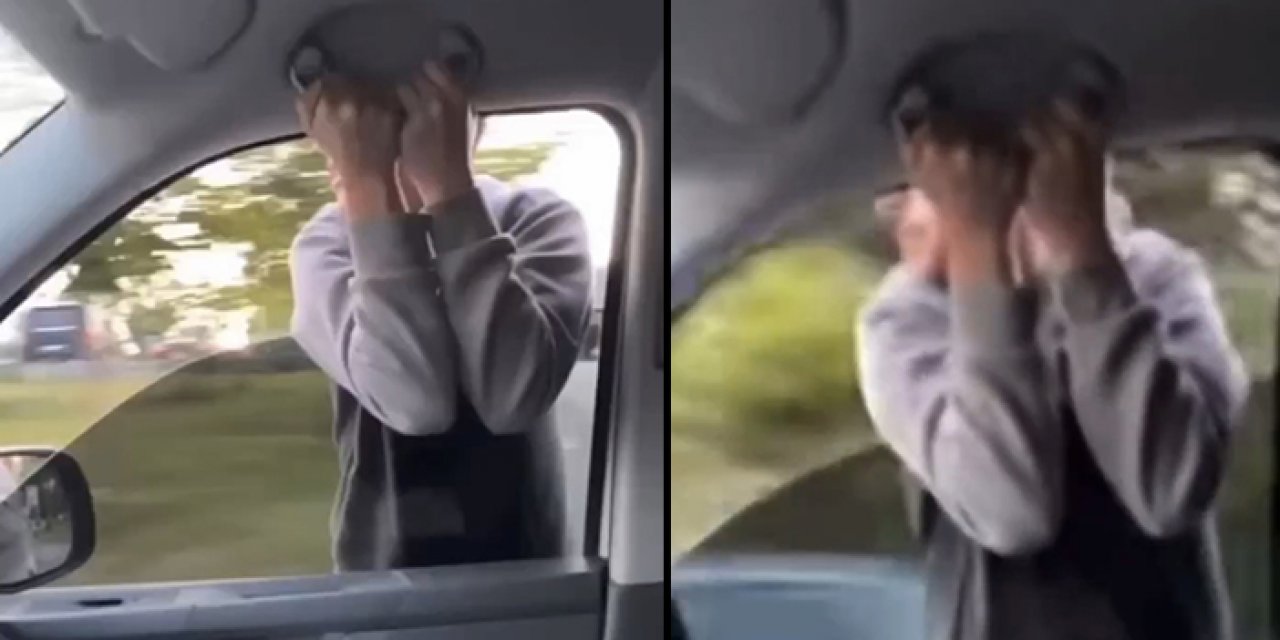 Canını hiçe saydı! Otomobilden sarkarak yolculuk yaptı