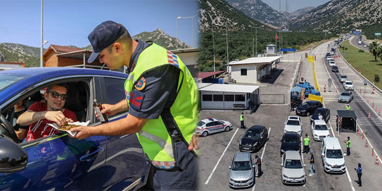 Kuyruklarda bekleyen tatilcilere polisten çikolata ikramı