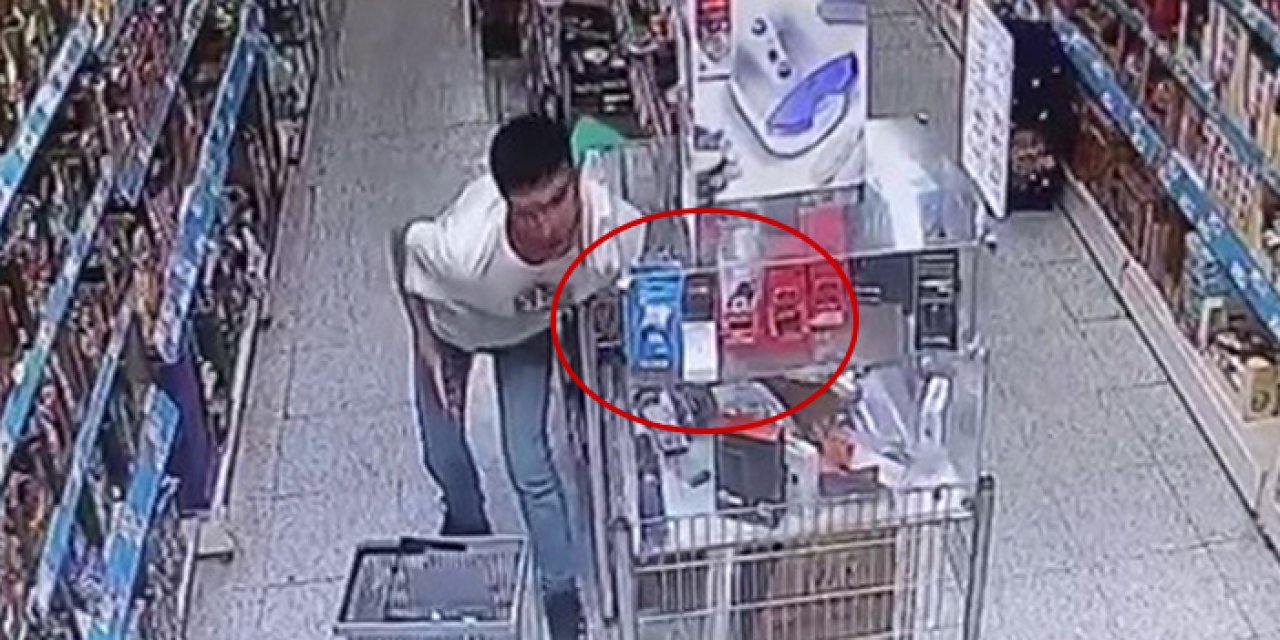 Cep telefonunu raftan böyle çaldı