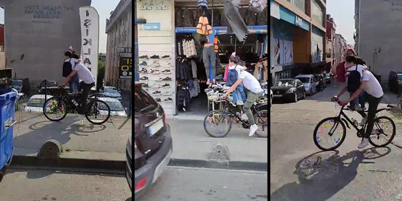 Görenler inanamadı! 2 çocukla tehlikeli yolculuk