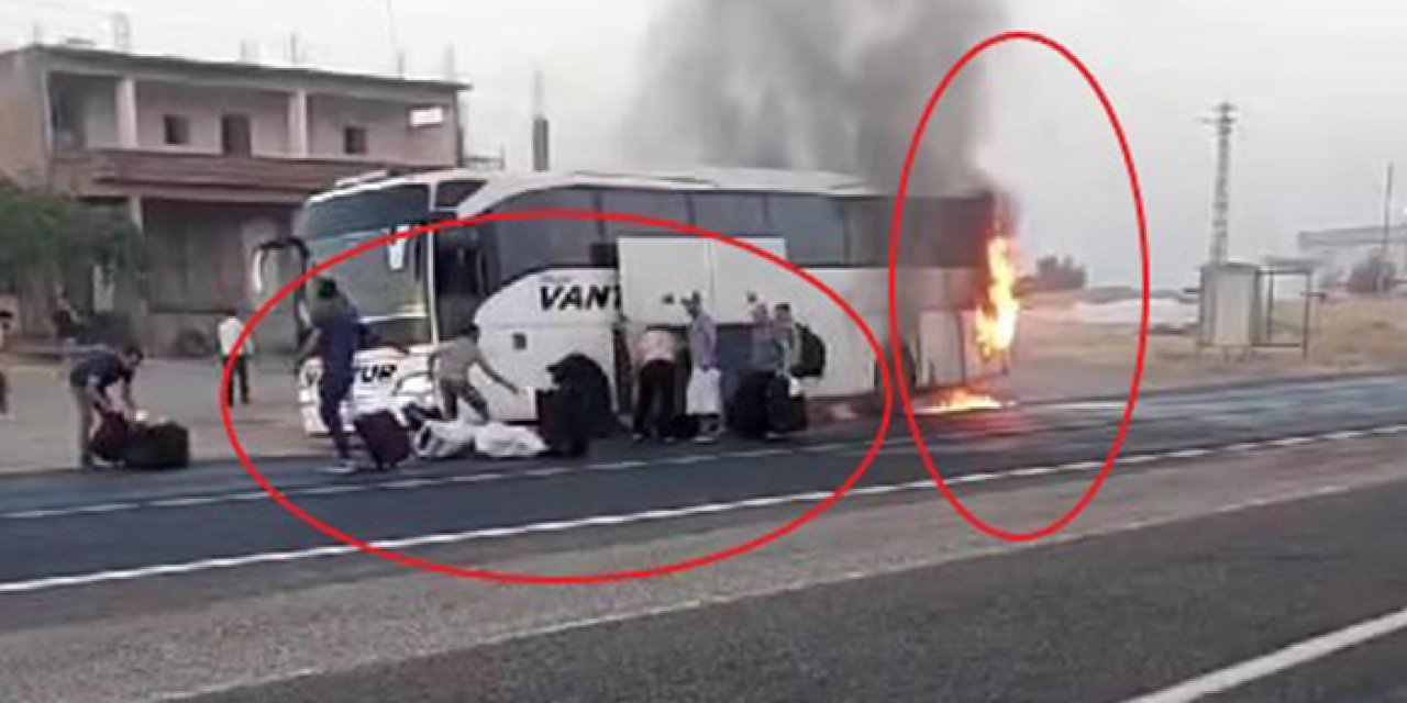 Otobüs yanarken valizlerini almaya çalıştılar