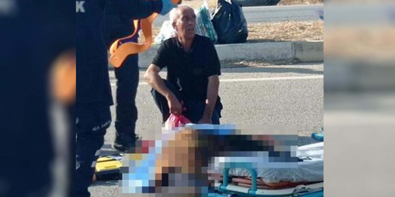 Yol ortasında eşinin başında bekledi