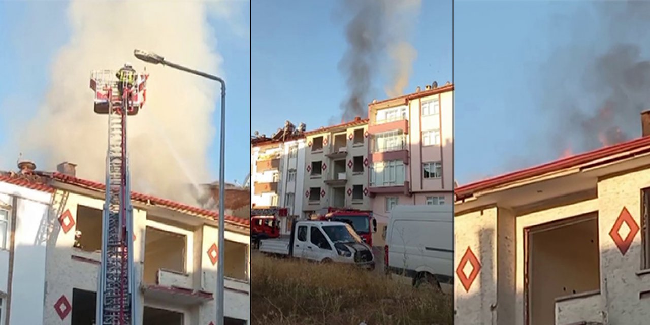 Hasarlı binanın çatısında yangın çıktı