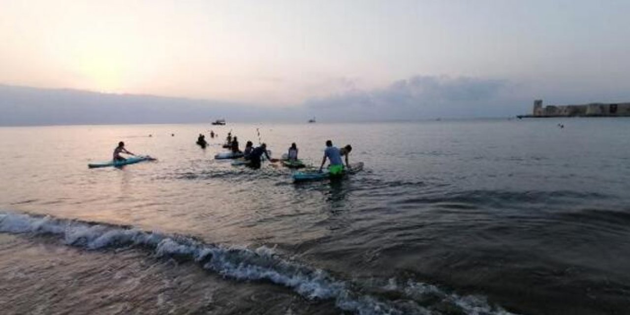 Gün doğumuna karşı kürek çektiler