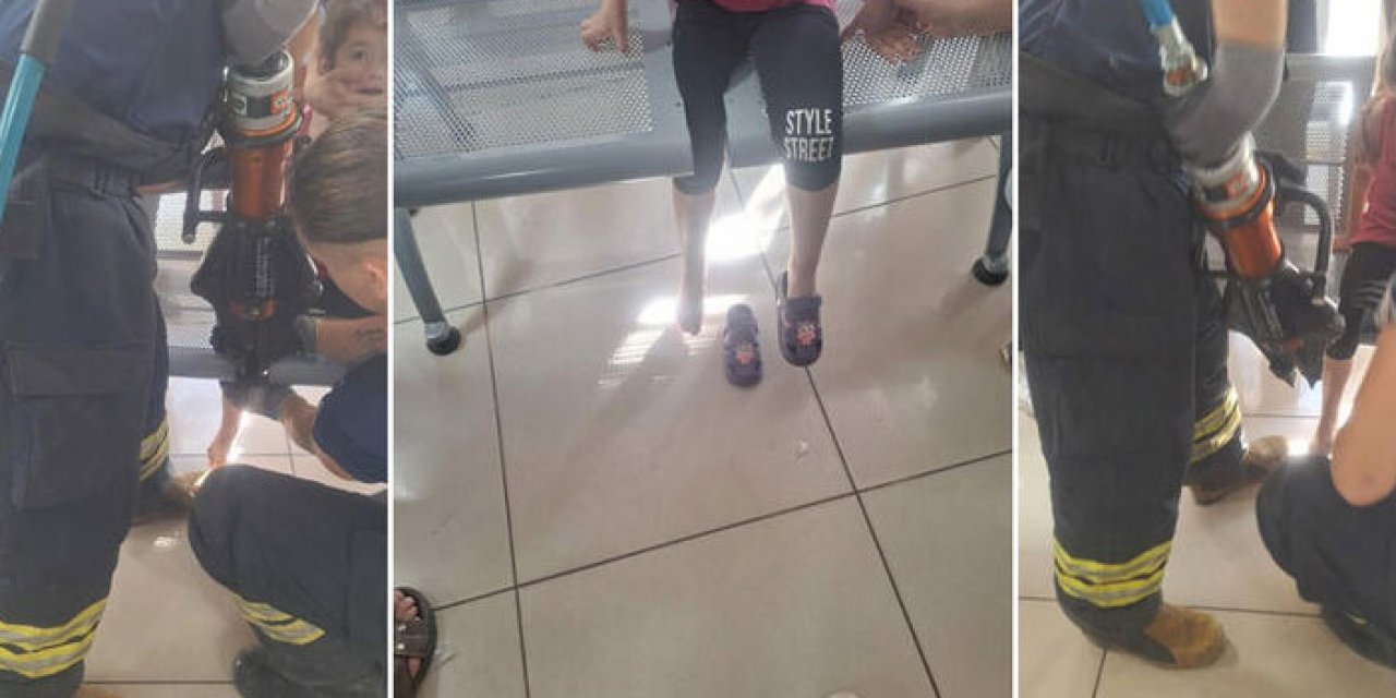 Posta gişesindeki banka bacağı sıkışan çocuğu itfaiye kurtardı