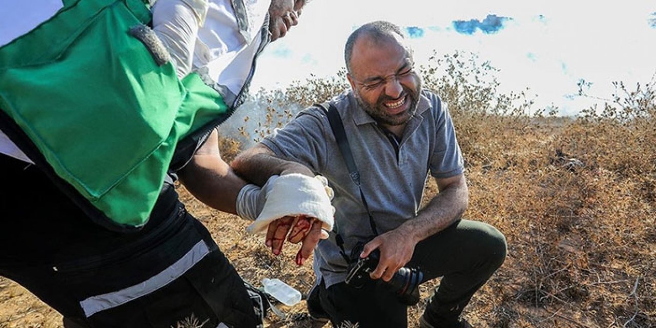 İsrail askerleri Gazze sınırında 12 Filistinliyi yaraladı