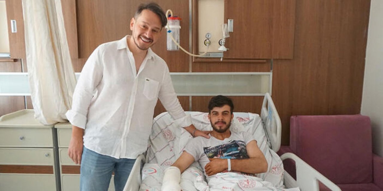 Ayı saldırısından köpekleri kurtardı