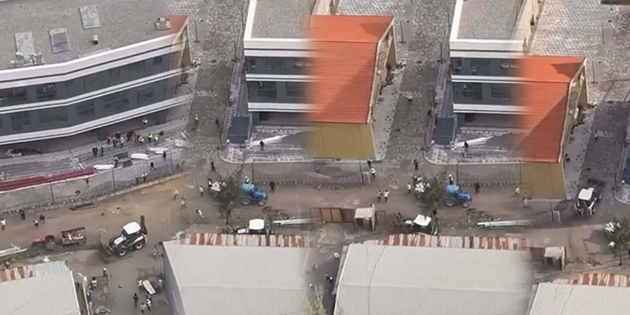 Tartıştığı işçileri iş makinesiyle kovaladı