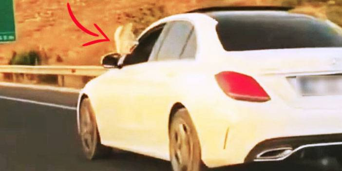 Araçtan ayaklarını çıkardı  trafikte tehlike yarattı