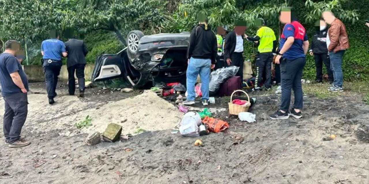 Kediyi kurtarmak isteyen sürücü sahile uçtu