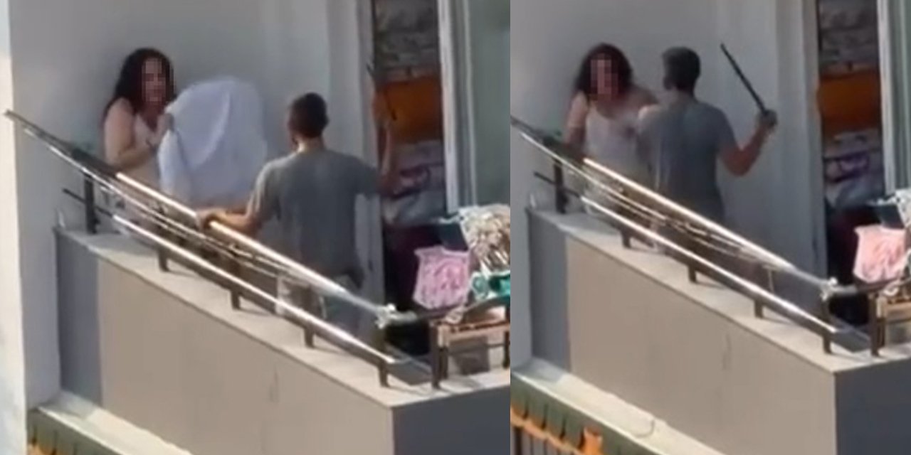 Balkonda tartıştığı kadını sopayla dövdü