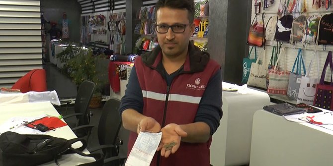 Yolda bulduğu faturanın borcunu ödedi
