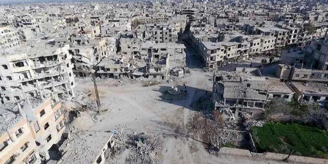 Doğu Guta'da bir sığınağa düzenlediği saldırıda 37 sivil yanarak can verdi.