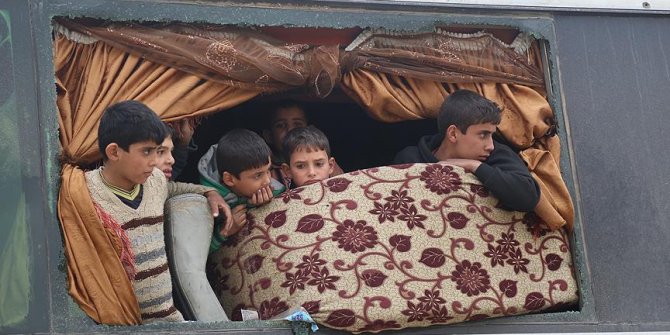 Doğu Guta'dan zorunlu tahliyeler sürüyor