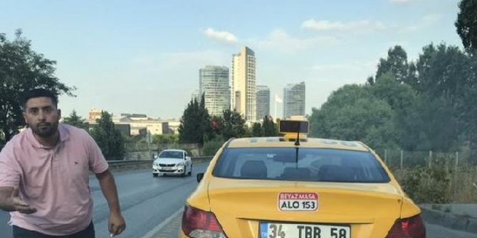 Yol vermedi diye yol kesip, tehdit eden taksici kamerada