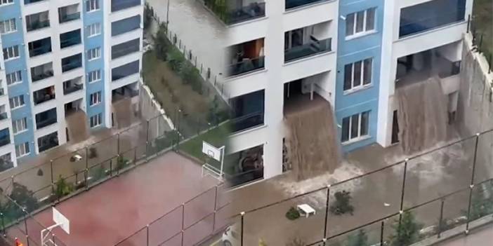 Yenimahalle'de bir binanın alt katlarını su bastı: Camları patlatarak dışarı taştı