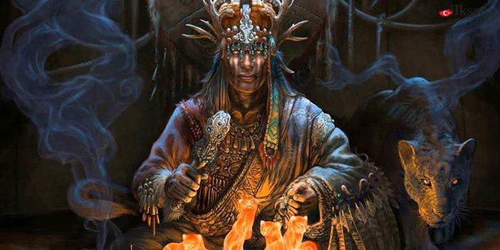 şamanizm ritüeli gerçekleştiren bir adam