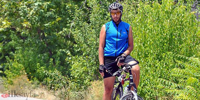 demir atlı adam bisikletiyle