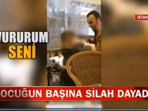 Dehşete düşüren görüntü' Çocuğun başına silah dayadı: 'Sıkarım kafana...'